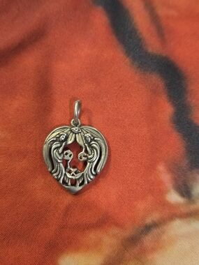Vintage "Reflections of Christ" sterling silver heart pendant.